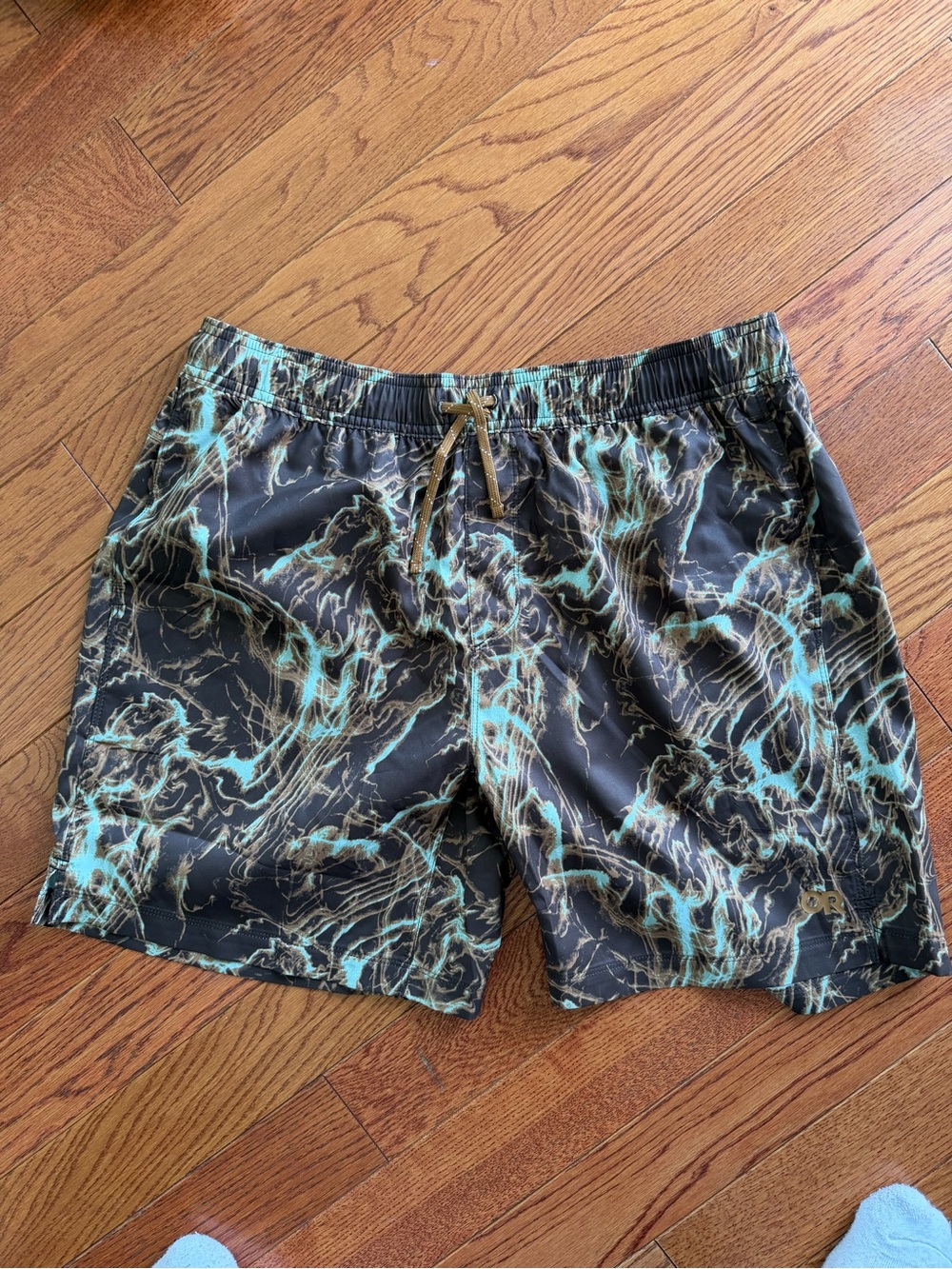 Outdoor Research Black Swim Shorts with Teal Marble Print